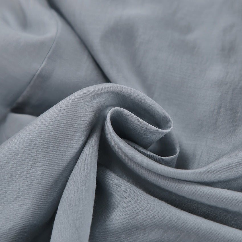 Damebluse med voluminøse flæsedetaljer og dyb V-udskæring Stilla