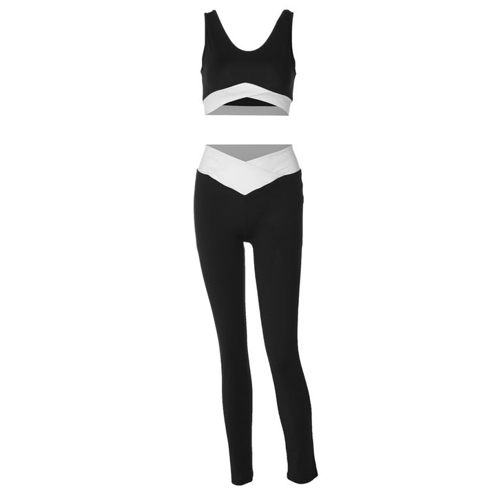 Dame Sporty sæt bestående af crop-top og high-waist leggings med asymmetrisk detaljer Stilla