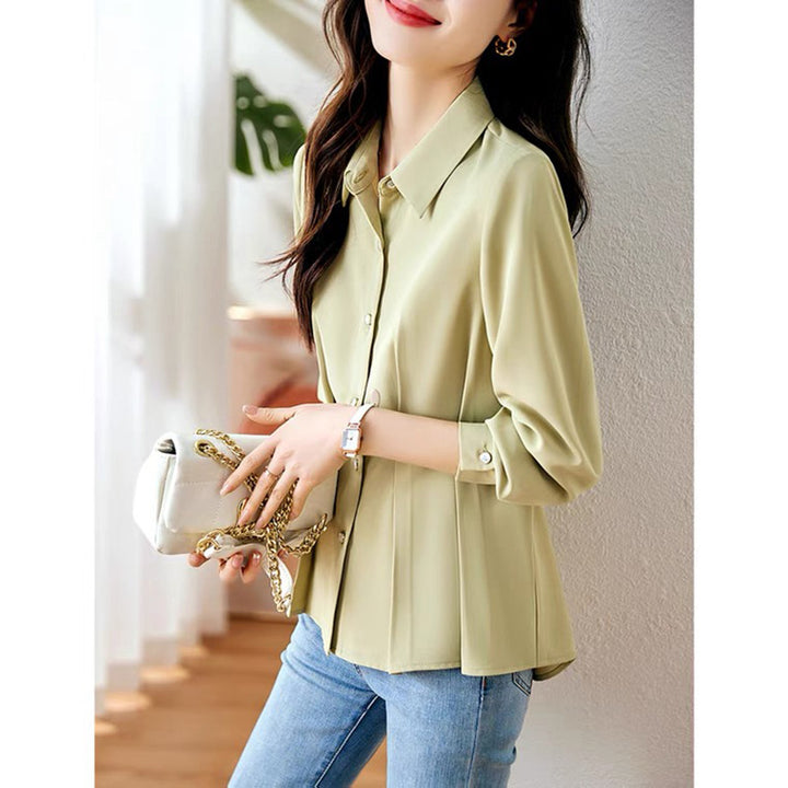 Dame elegant bluse med rynker og kvalitets knapdetaljer Stilla