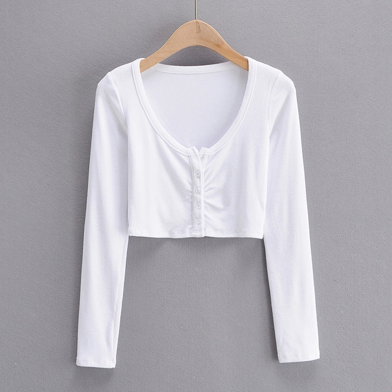Dame cropped langærmet shirt med knapdetaljering og fin struktur Stilla