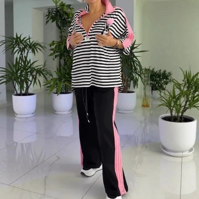 Dame overdimensioneret polo T-shirt med stribet design og modige accenter Stilla