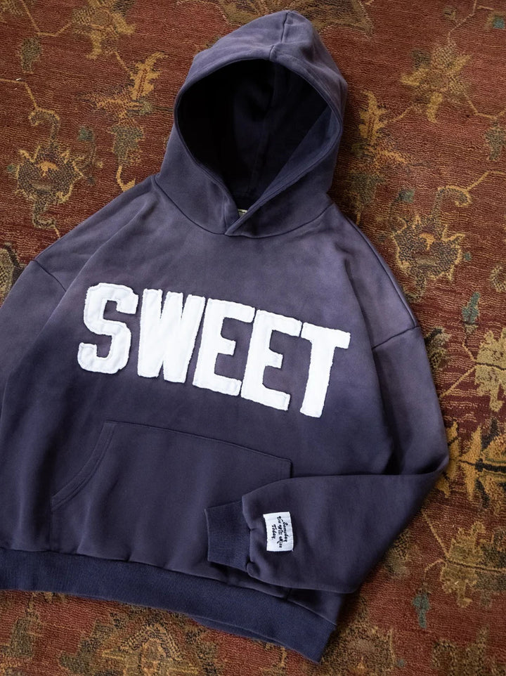 Unisex nan weit gesnit hoodies med påsyede bogstaver og kængurulomme Skovae
