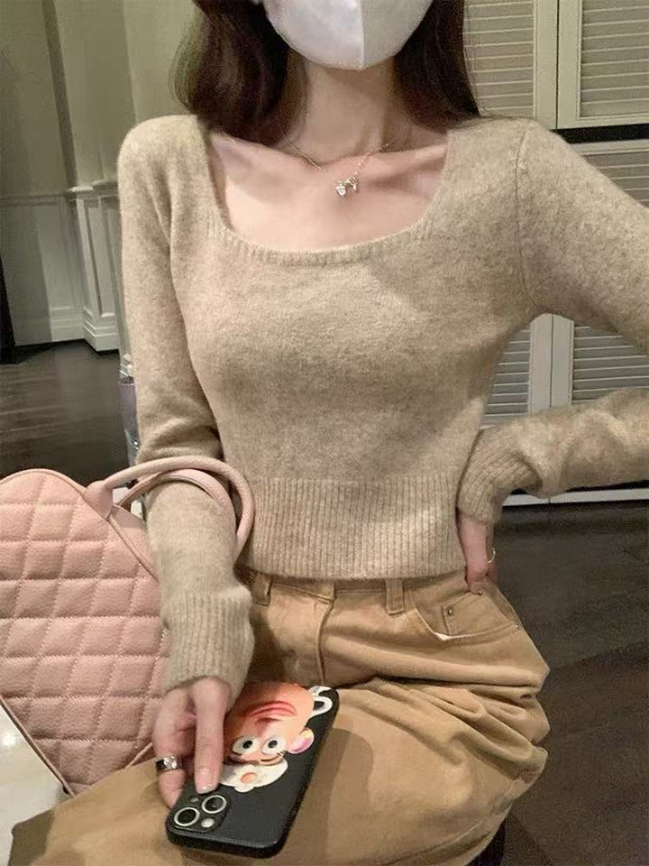 Kvinders fashionable sweater med bred rund halsudskæring og fin tekstur Stilla