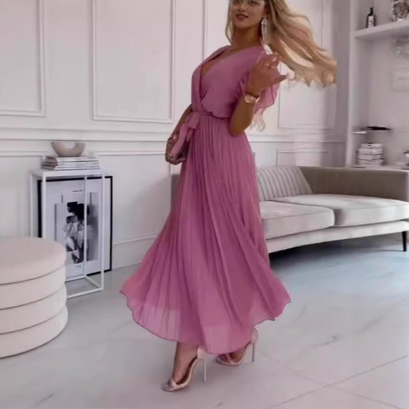 Dame maxikjole med elegant omslagsdesign og svajende flæserkirtel Stilla