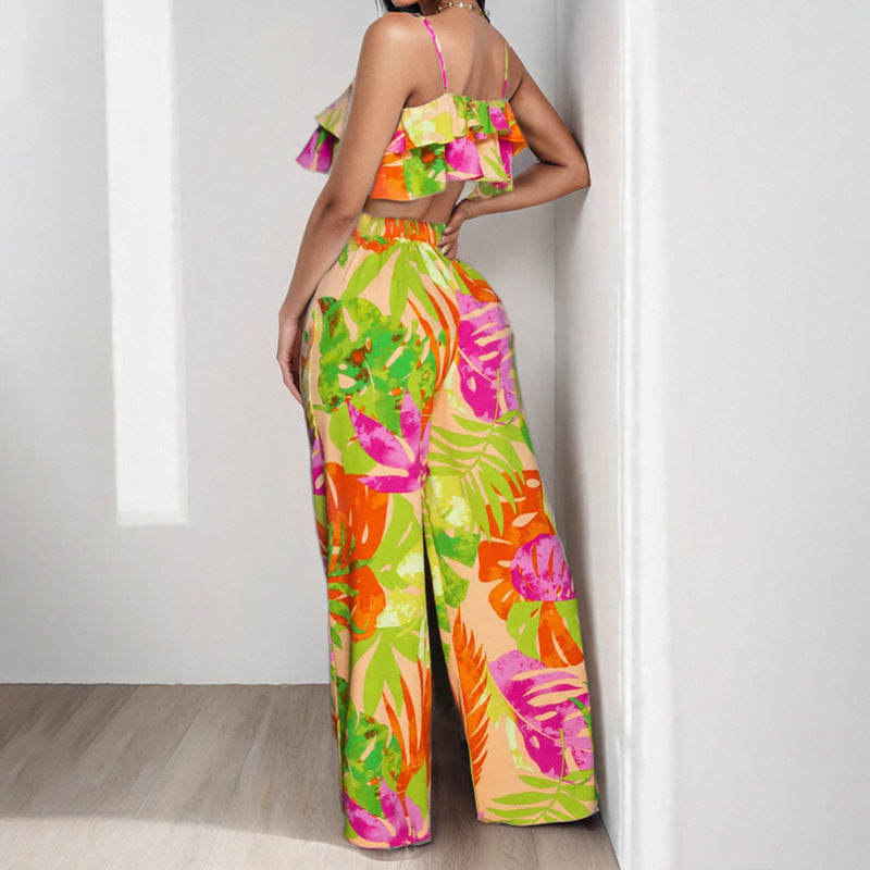 Dame to-delt sommeroutfit med ruffle-bluse og vide bukser Stilla