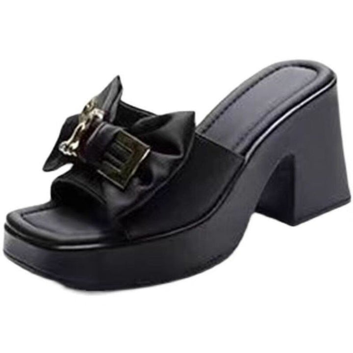 Dame elegante mules med dekorativt sløjfedetalje og stabil platform Stilla