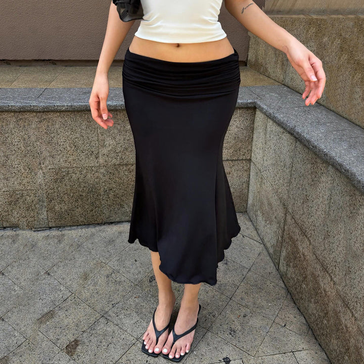 Damen eleganter, fließender Midi-Rock mit dehnbarem Bund und geschwungenem Saum Skovae