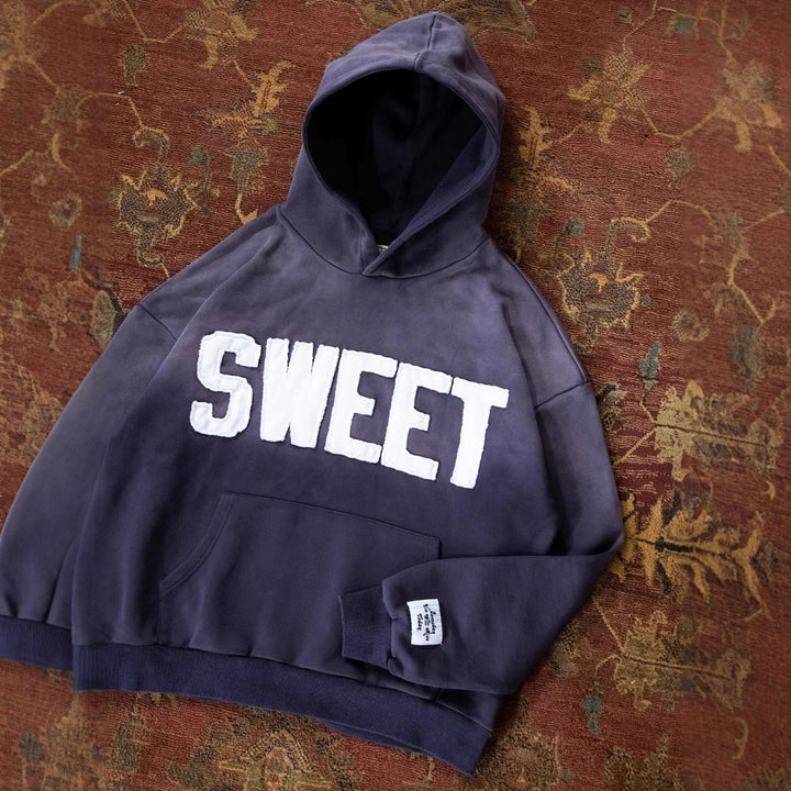 Unisex nan weit gesnit hoodies med påsyede bogstaver og kængurulomme Skovae