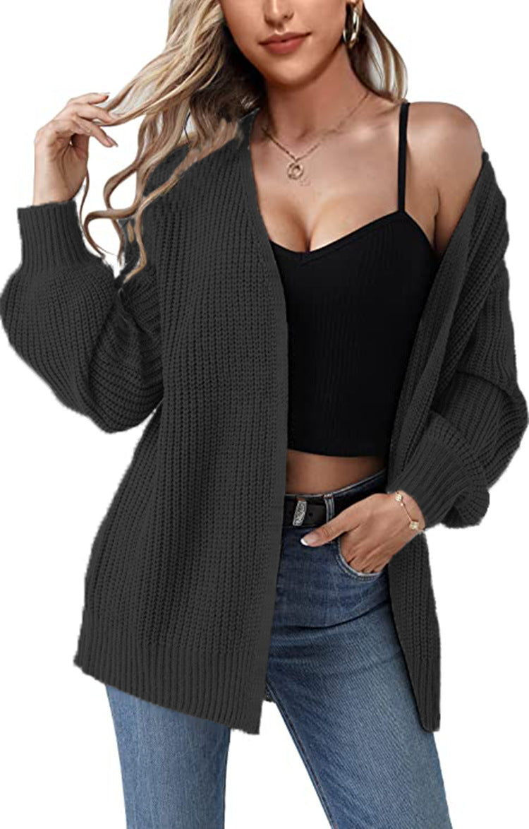 Kvinders chunky strikket cardigan med en afslappet pasform og åbne stinger Stilla