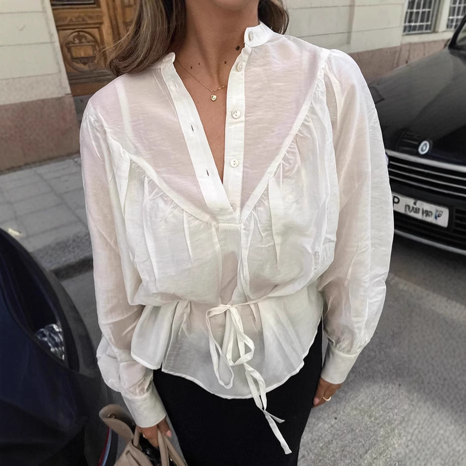 Damebluse med taljeret silhuet og elegant snøring Stilla