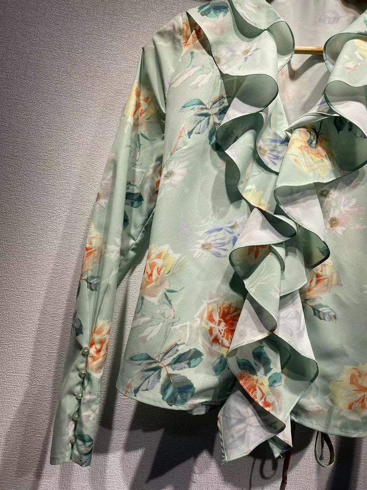 Dame ruffles blouse med floral design og elegante detaljer Stilla