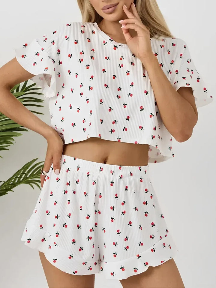 Dame let pyjamasæt med legende blomsterdesign og flæser Stilla
