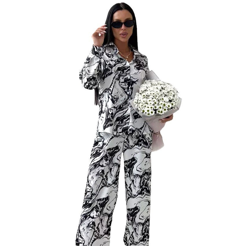 Dame sæt bestående af elegant bluse og vidde bukser Stilla