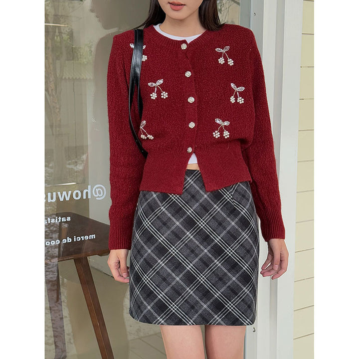 Dame rutet mini skirt i blød uldblanding med elegante lommer og plisseringer Stilla