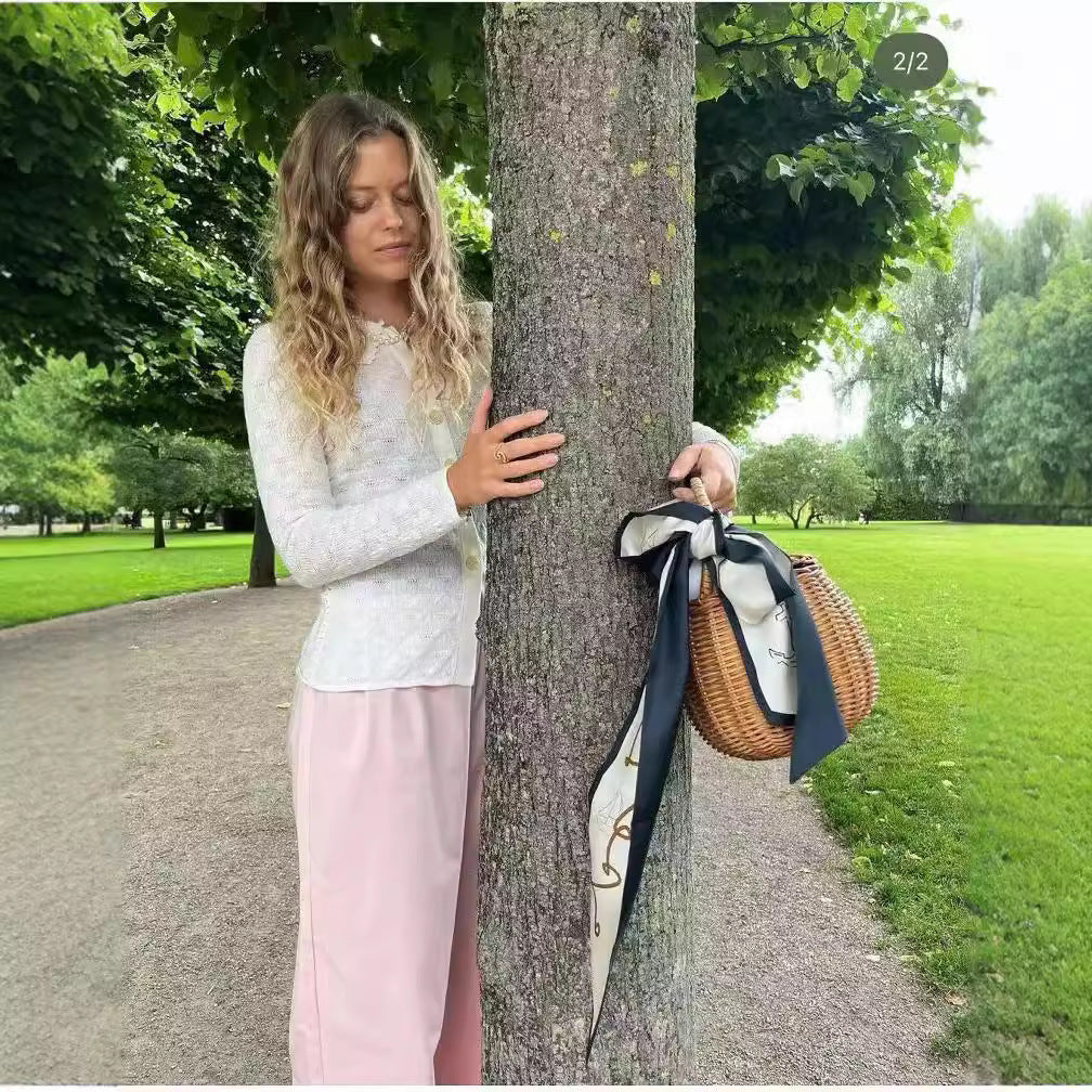 Damer strikjakke med elegant krave og fine knapdetaljer Stilla