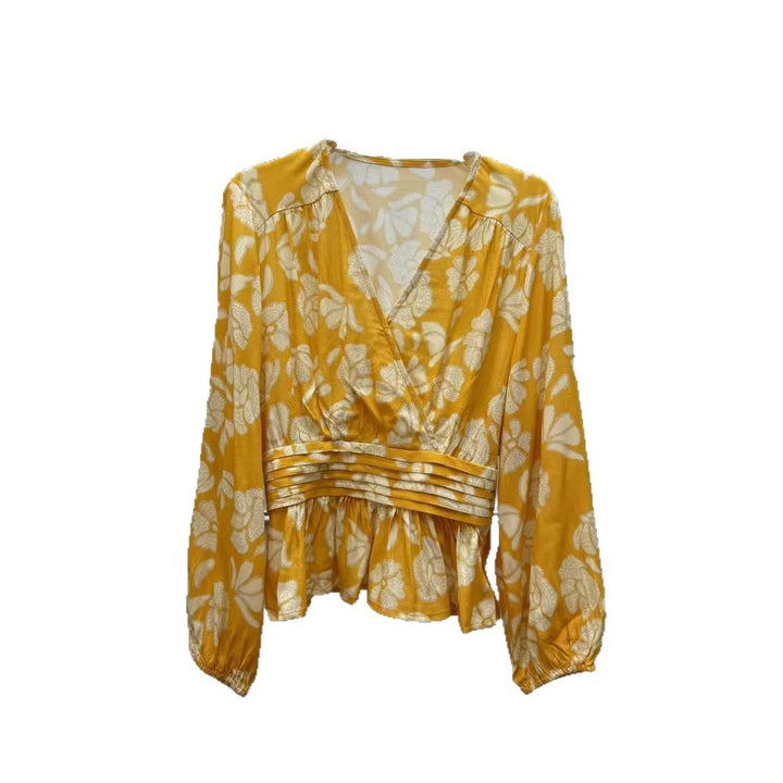 Damernes indpakningsbluse med fint blomstermønster og raffineret gummibånd Stilla