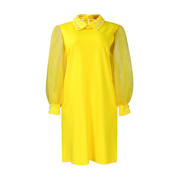 Damekjole med transparente ærmer og elegante perledetaljer Stilla