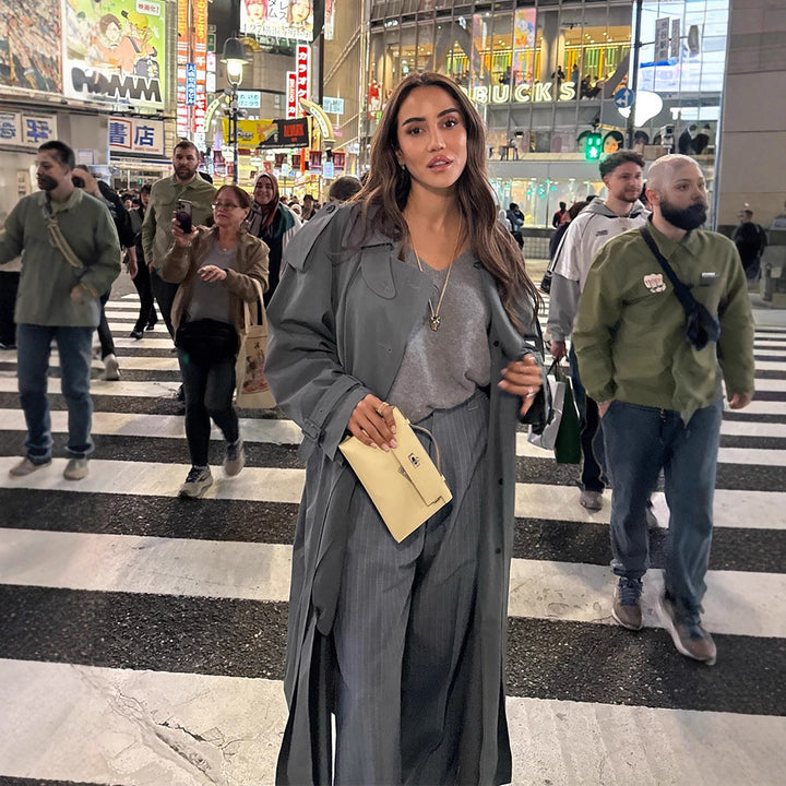 Damer elegant lang trenchcoat med struktureret design og bred krave Stilla