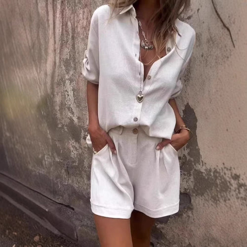 Dame Kort jumpsuit med elegant skjortekrave og taljebælte Skovae
