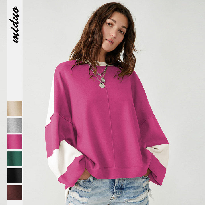 Dame afslappet sweatshirt med løst snit og elegante blokstriber Stilla
