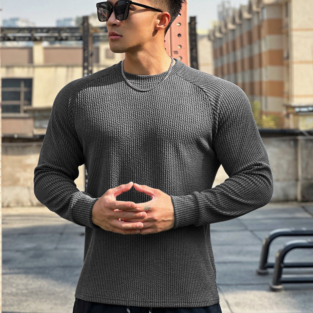 Herrer Langærmet Fitnesstop med elegant ribstruktur og åndbare egenskaber Stilla