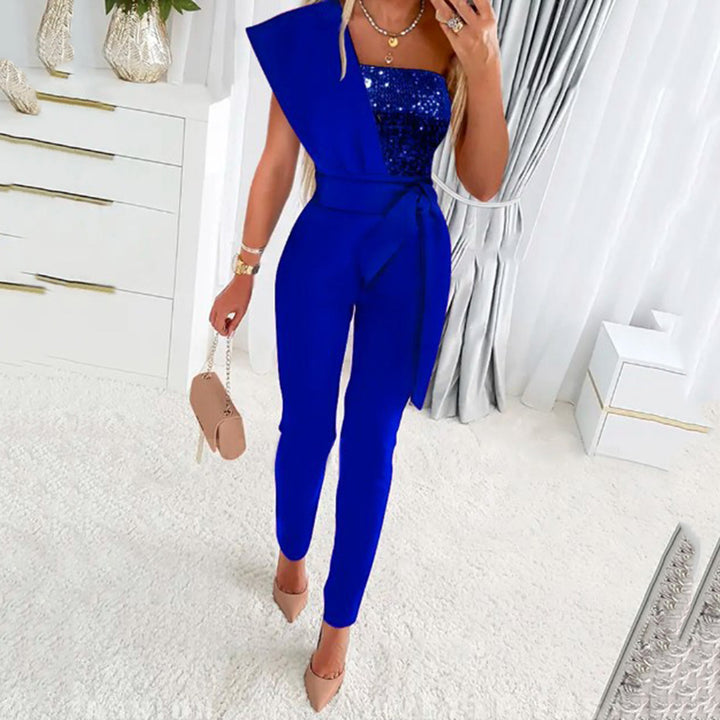 Dame elegant jumpsuit med asymmetrisk snit og glitrende overdel Stilla