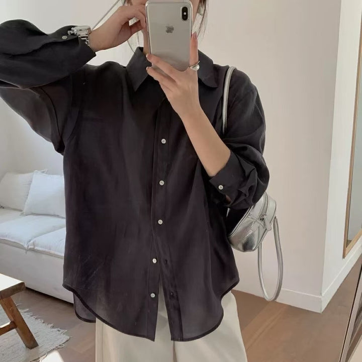 Dame Relaxed Fit Button-Up Bluse med unikt rygdetalje Stilla