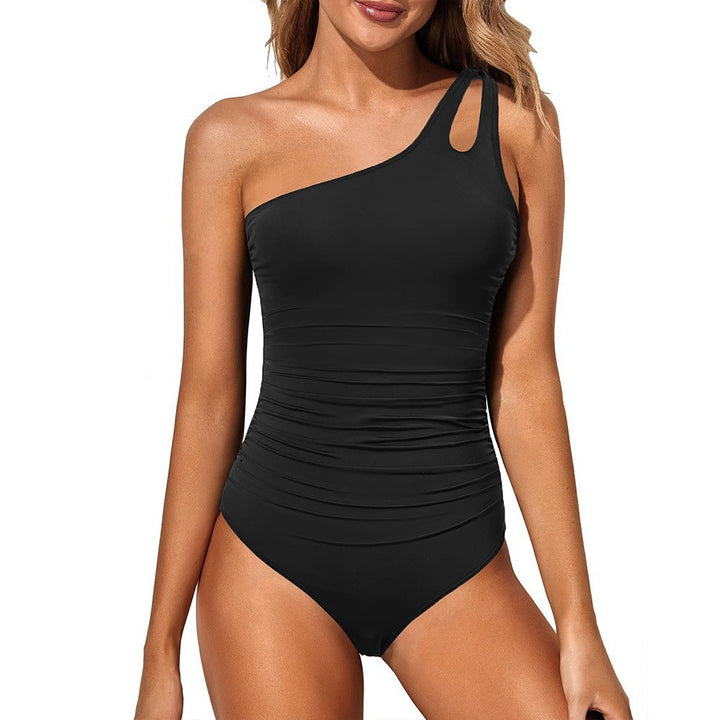 Dame étår badebadedragt med asymmetrisk cut-out-design Skovae