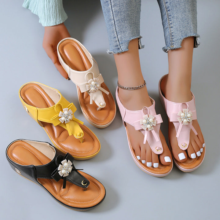 Dame Komfortable Wedge-Sandaler med elegante Blomsterapplikationer Stilla
