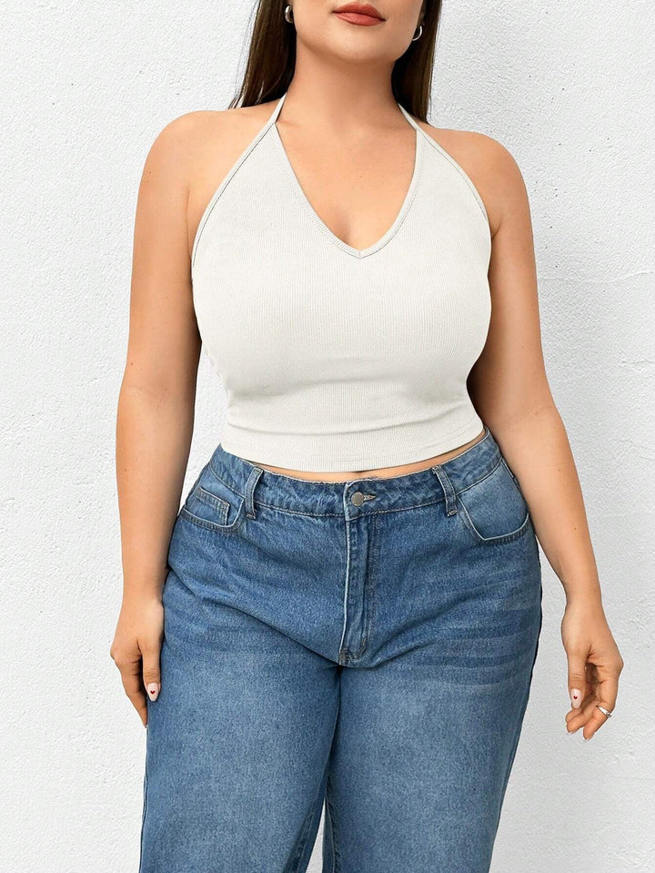 Dame sporty crop-top med V-udskæring og fin ribstruktur Stilla