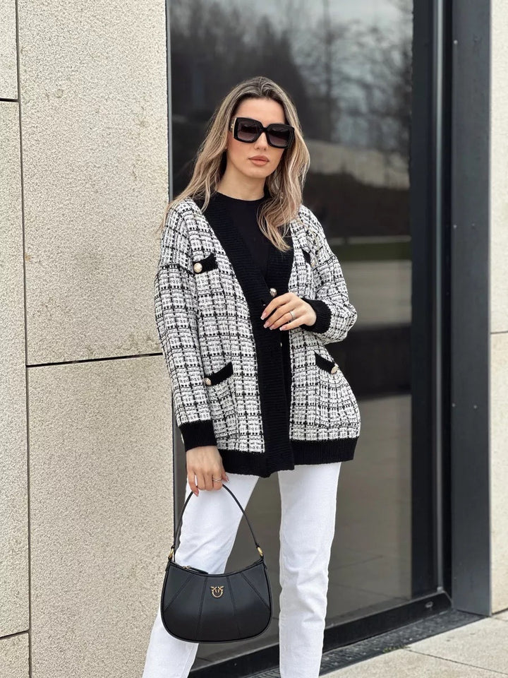 Kvinders bouclé cardigan med elegante knapdetaljer Stilla