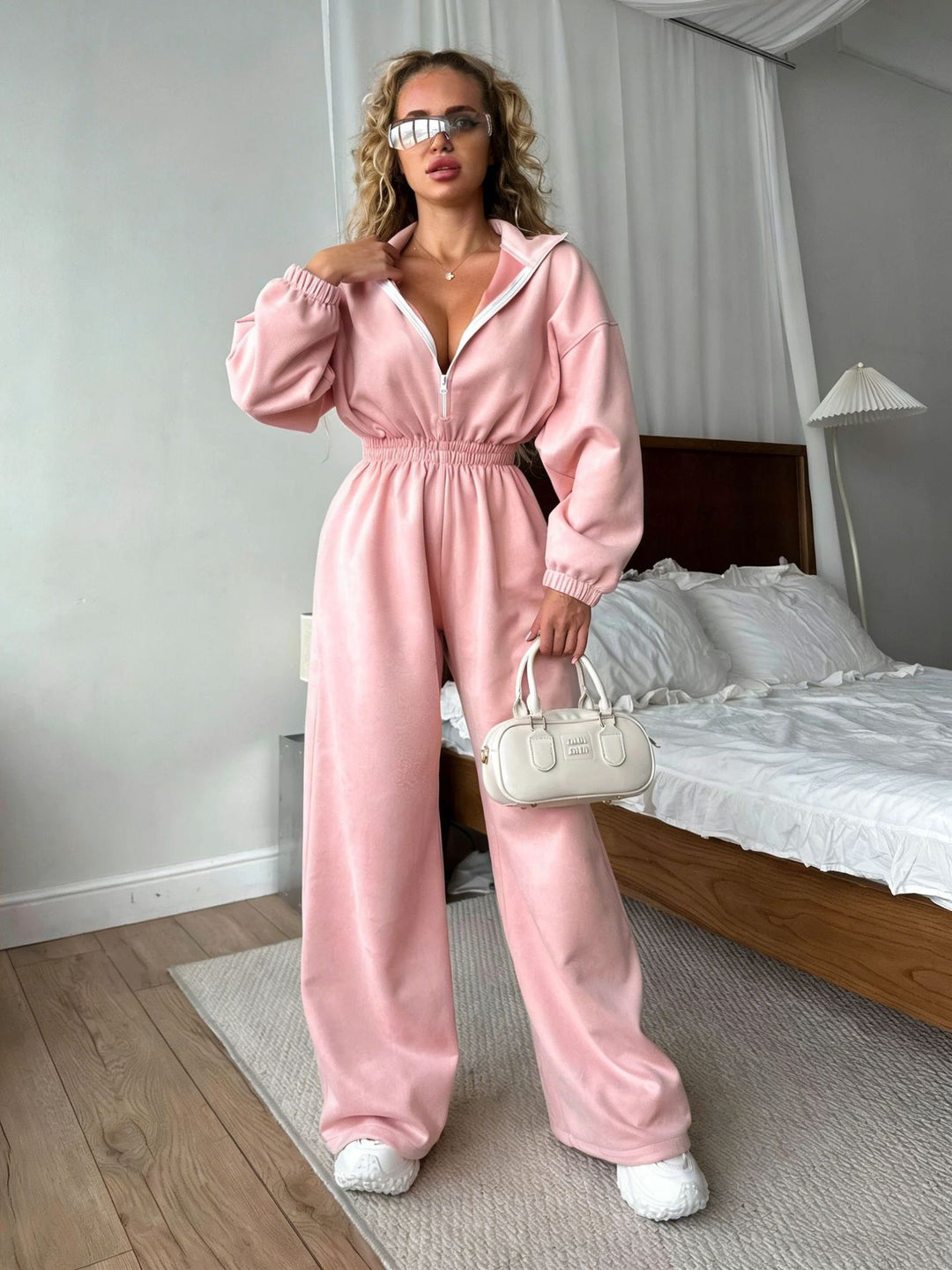 Kvinders fleece jumpsuit med høj krave og elastisk bånd
