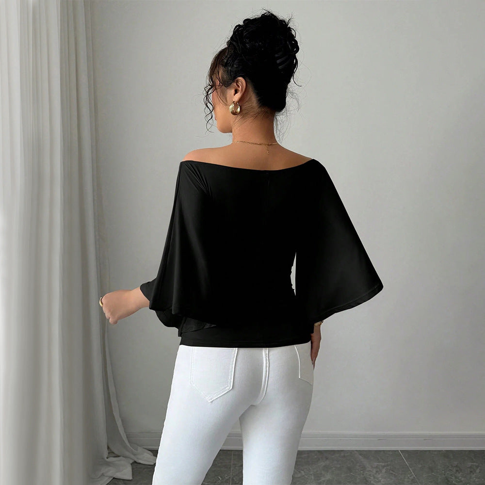 Kvinders elegante off-shoulder top med brede ærmer og figursyet pasform Stilla