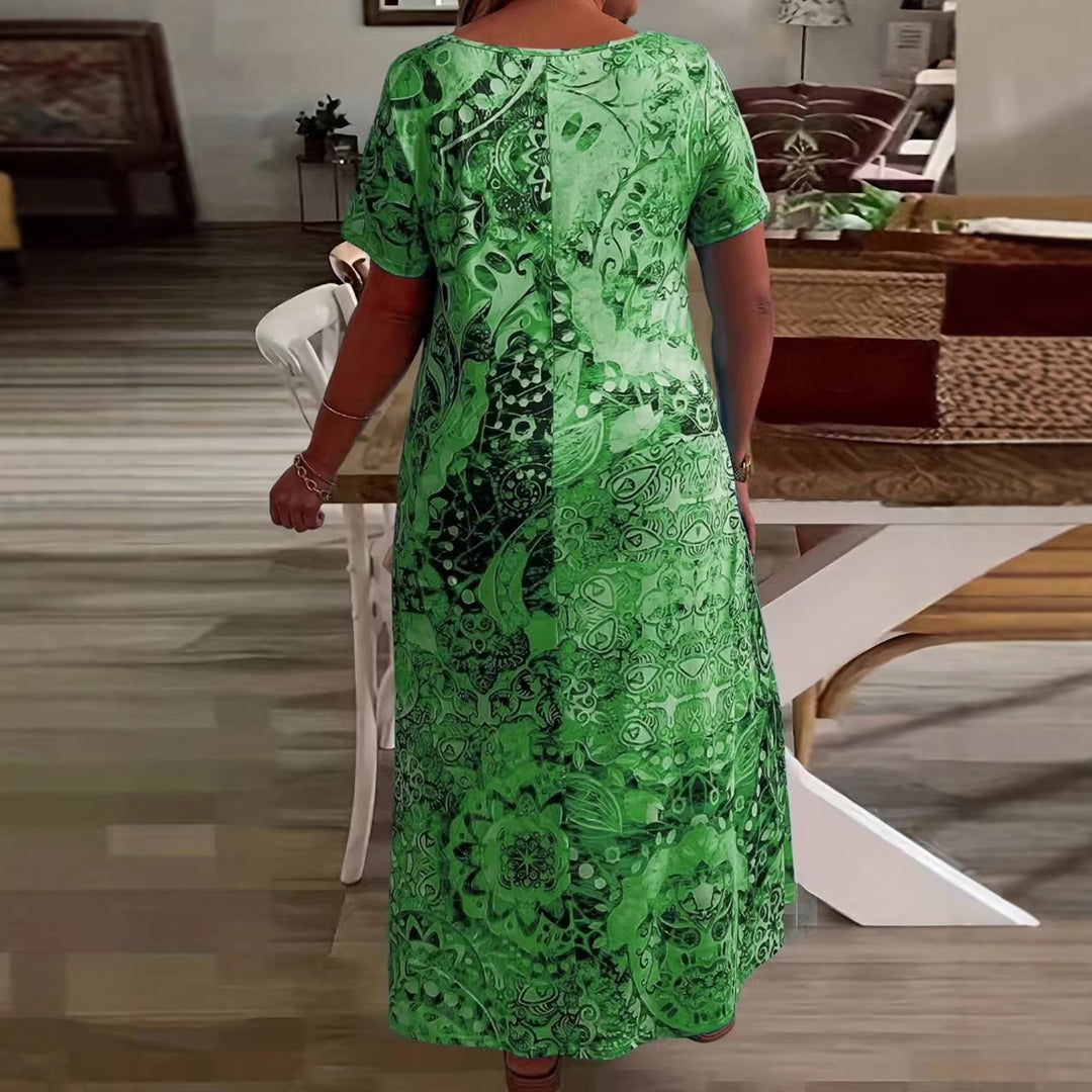 Dame Maxikjole med elegante mønstre og flydende snit Skovae