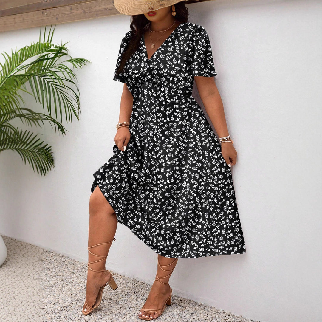 Dame Midi-kjole med blomsterprint og flattering slids Skovae