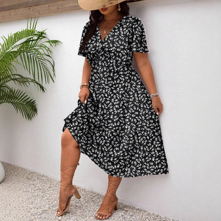 Dame Midi-kjole med blomsterprint og flattering slids Skovae