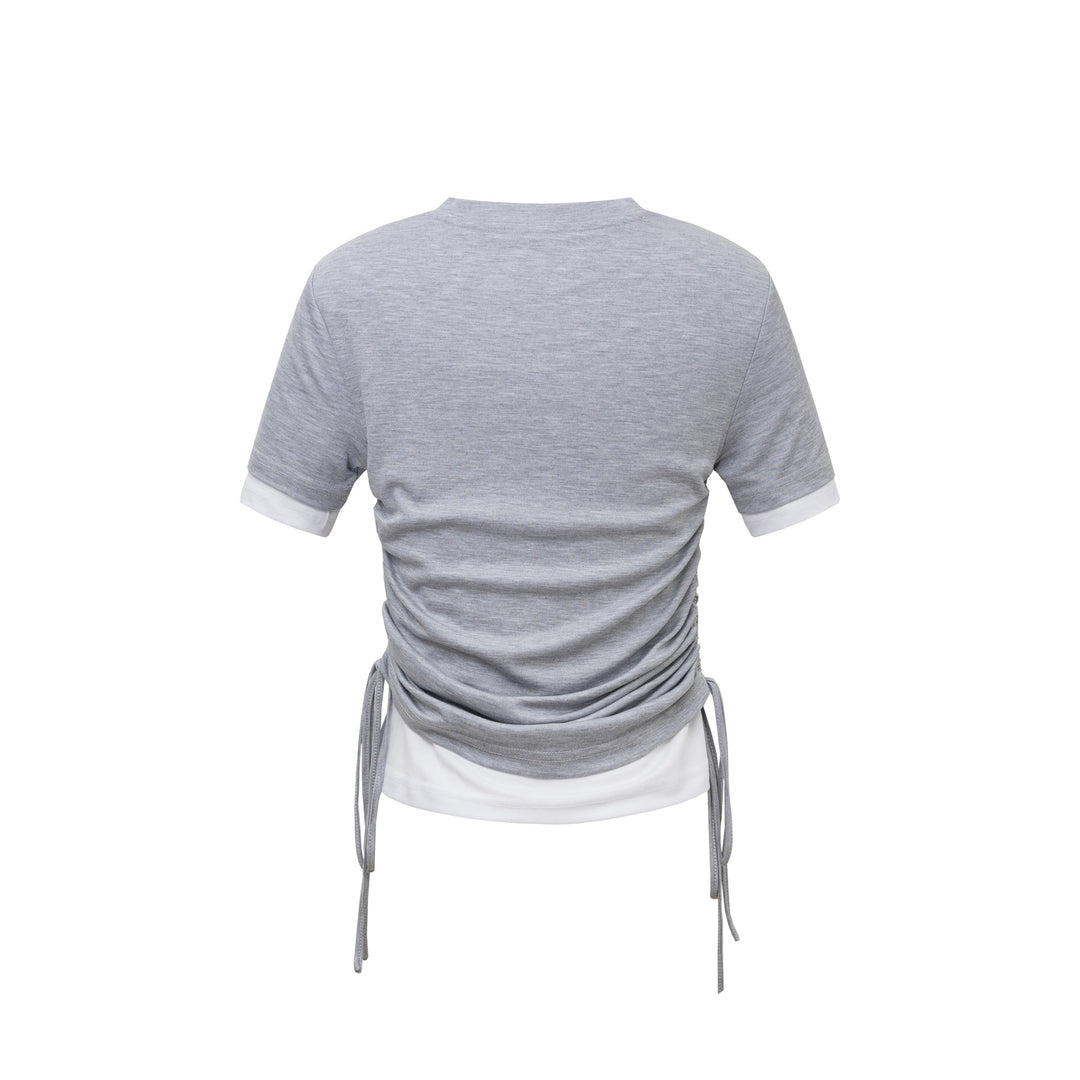 Damer figurtilpasset T-shirt med unikt design og fashionable kontrastærmer Stilla
