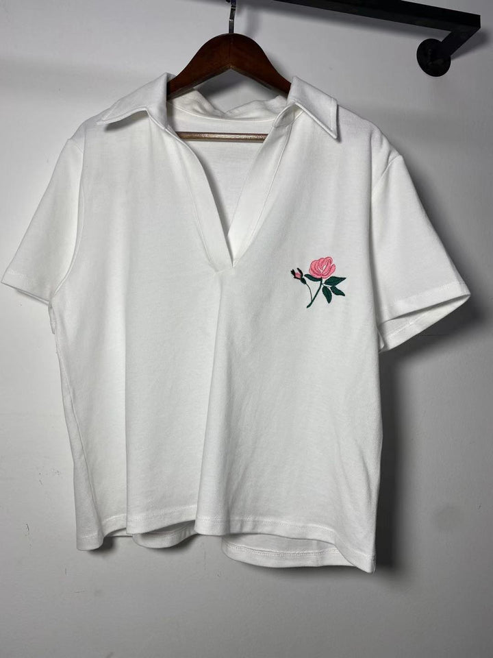 Dame polo T-shirt med blomster broderi Stilla