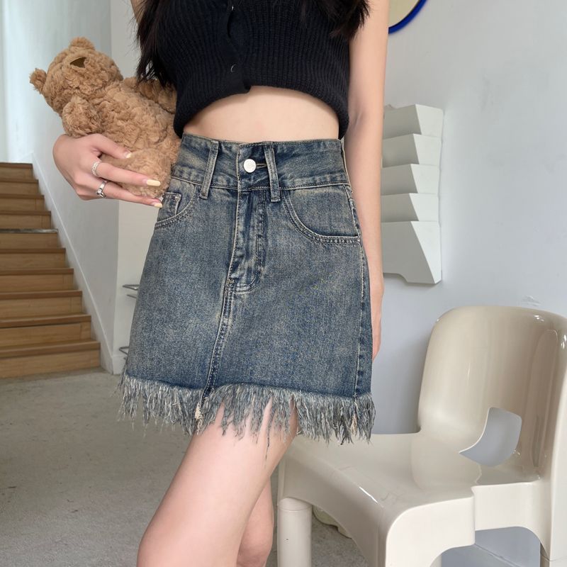 Kvinder's denim shorts med flagrende kant og høj talje