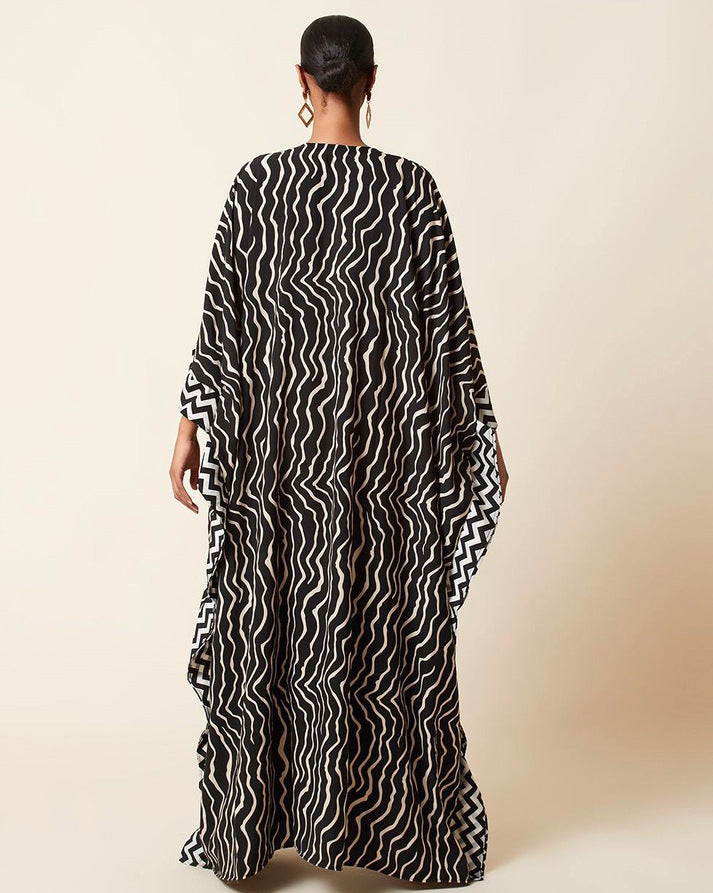 Dame Kaftan med dekorativ zebra-optik og elegante detaljer Stilla