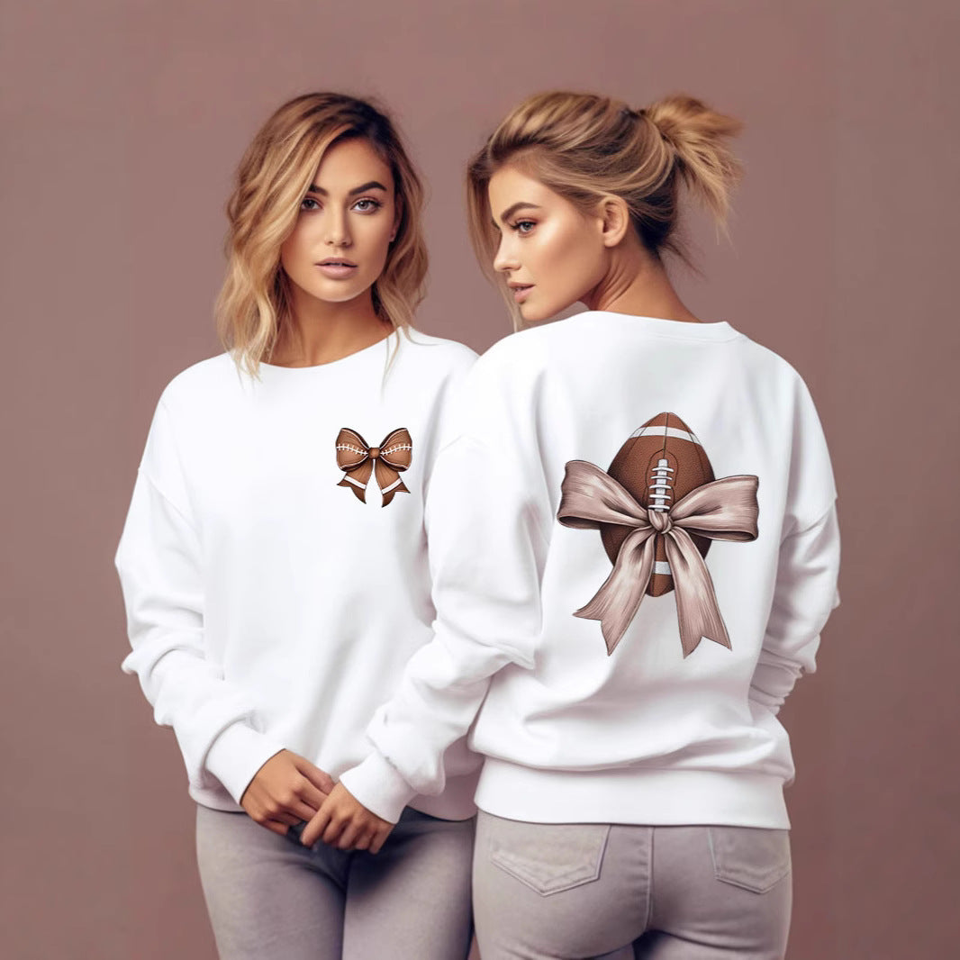 Dame sweatshirt med sødt fodboldmotiv og sløjfeaccent Stilla
