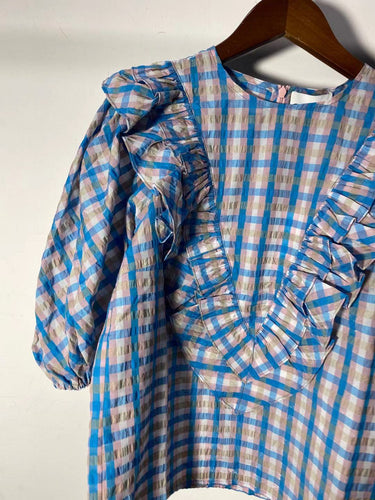 Dame skjorte med voluminøse flæsedetaljer og ternet design Stilla