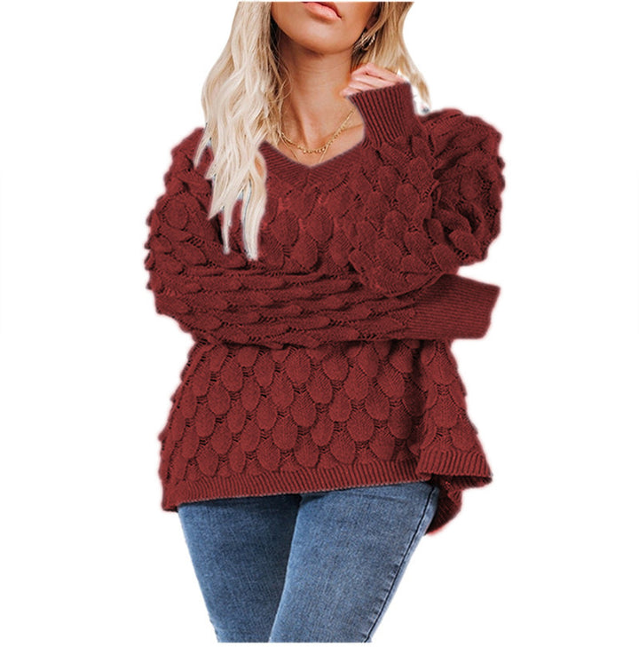 Kvinders chunky strikket sweater med skulpturel bølgemønster og V-hals Stilla