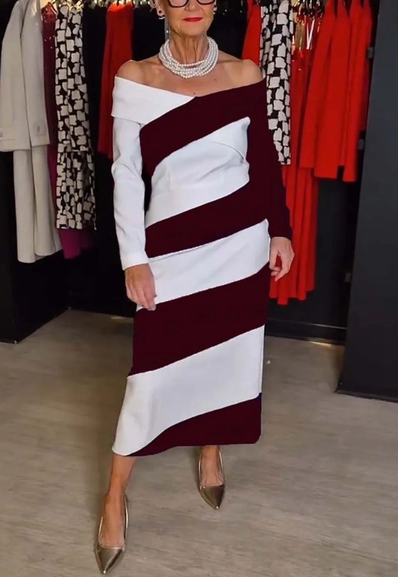 Dame Maxikjole med asymmetrisk snit og stilfuldt laglook Stilla