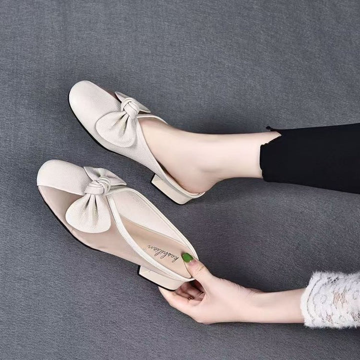 Dame elegante mules med moderigtigt sløjfedetalje og komfortabel blokhæl Stilla