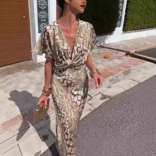 Dame knælangt omslagskjole med blomstermønster og elegant V-udskæring Stilla