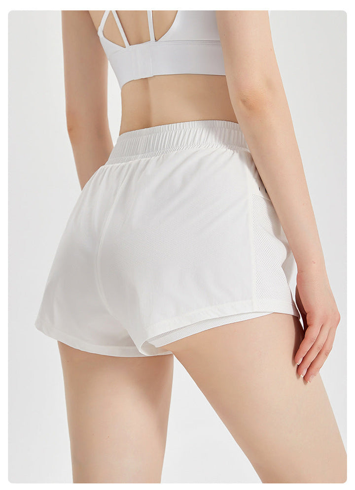 Stilla | Liv Anti Chafe Yoga Shorts Hurtør, Lommer & Mavekontrol