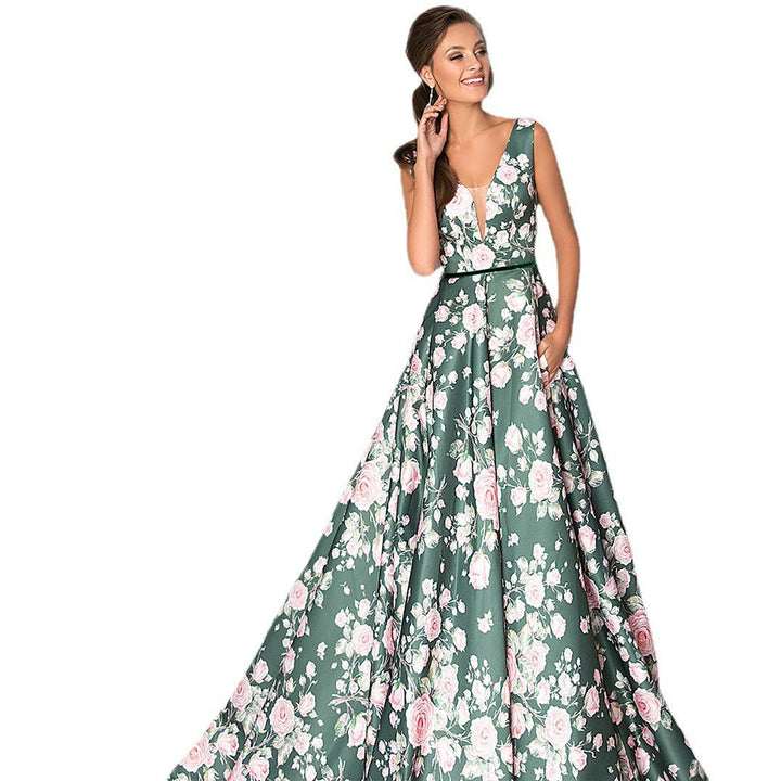 Dame maxikjole med elegant floral print og svingende kant Stilla