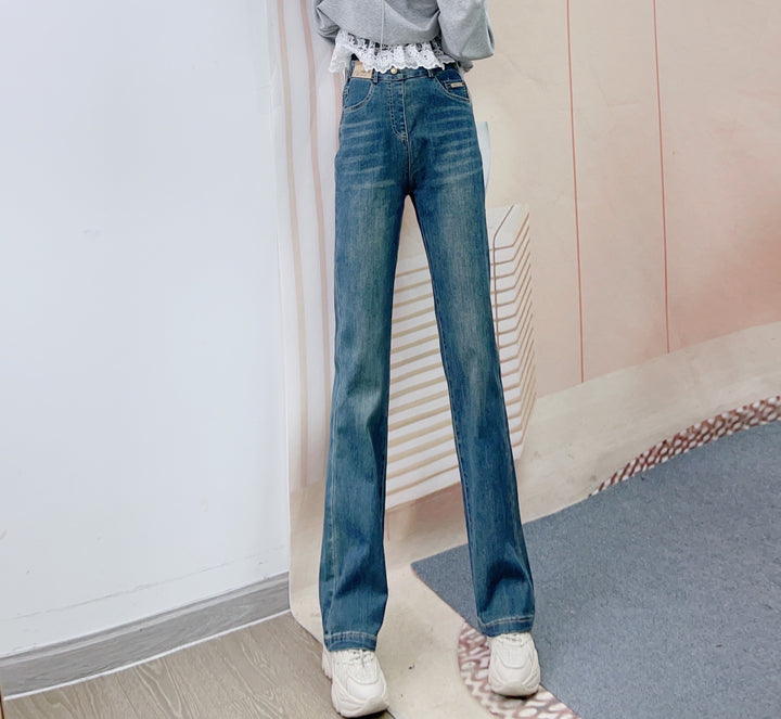 Dame Bredskårne High-Waist Jeans i vintage-stil med afslappet snit og elegante folder Stilla