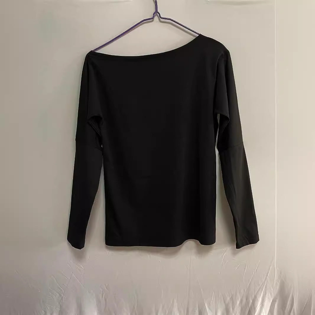 Dame Elegant og afslappet top med en skulderudskæring og knapdetaljer Stilla
